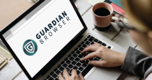 person on laptop displaying Guardian Browser logo